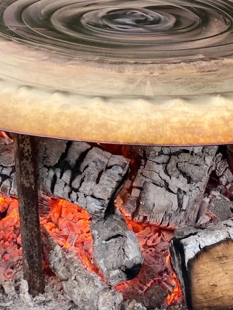 The firing process is done in collaboration with the elements – come rain or shine, each gong takes on its own final appearance.